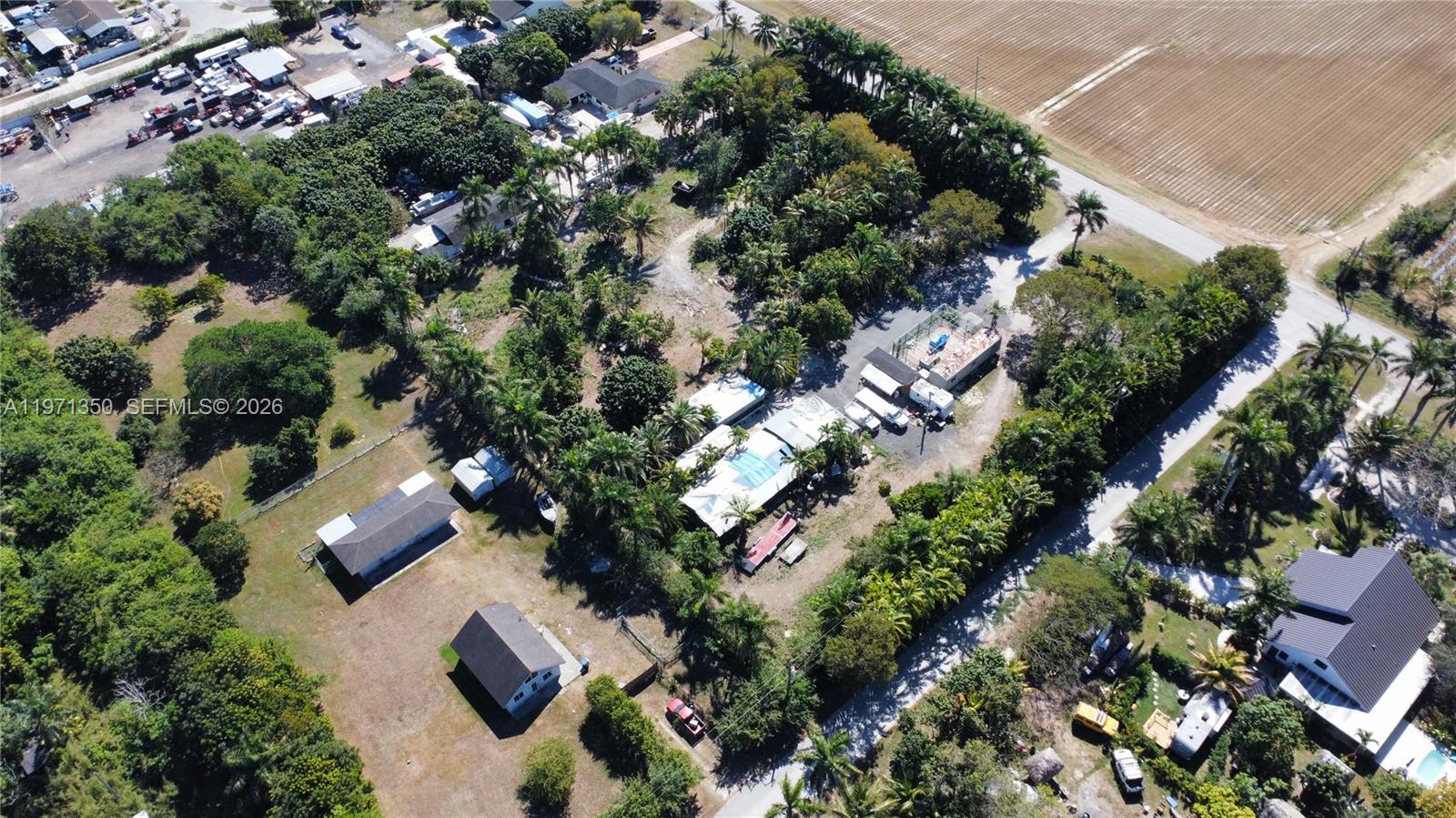 19355 Southwest 320th Street Homestead, FL 33030 - Photo 3 of 10 an aerial view of multiple house