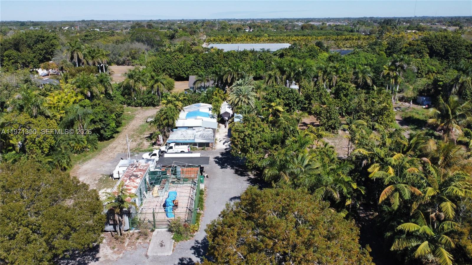 19355 Southwest 320th Street Homestead, FL 33030 - Photo 7 of 10 a view of a city