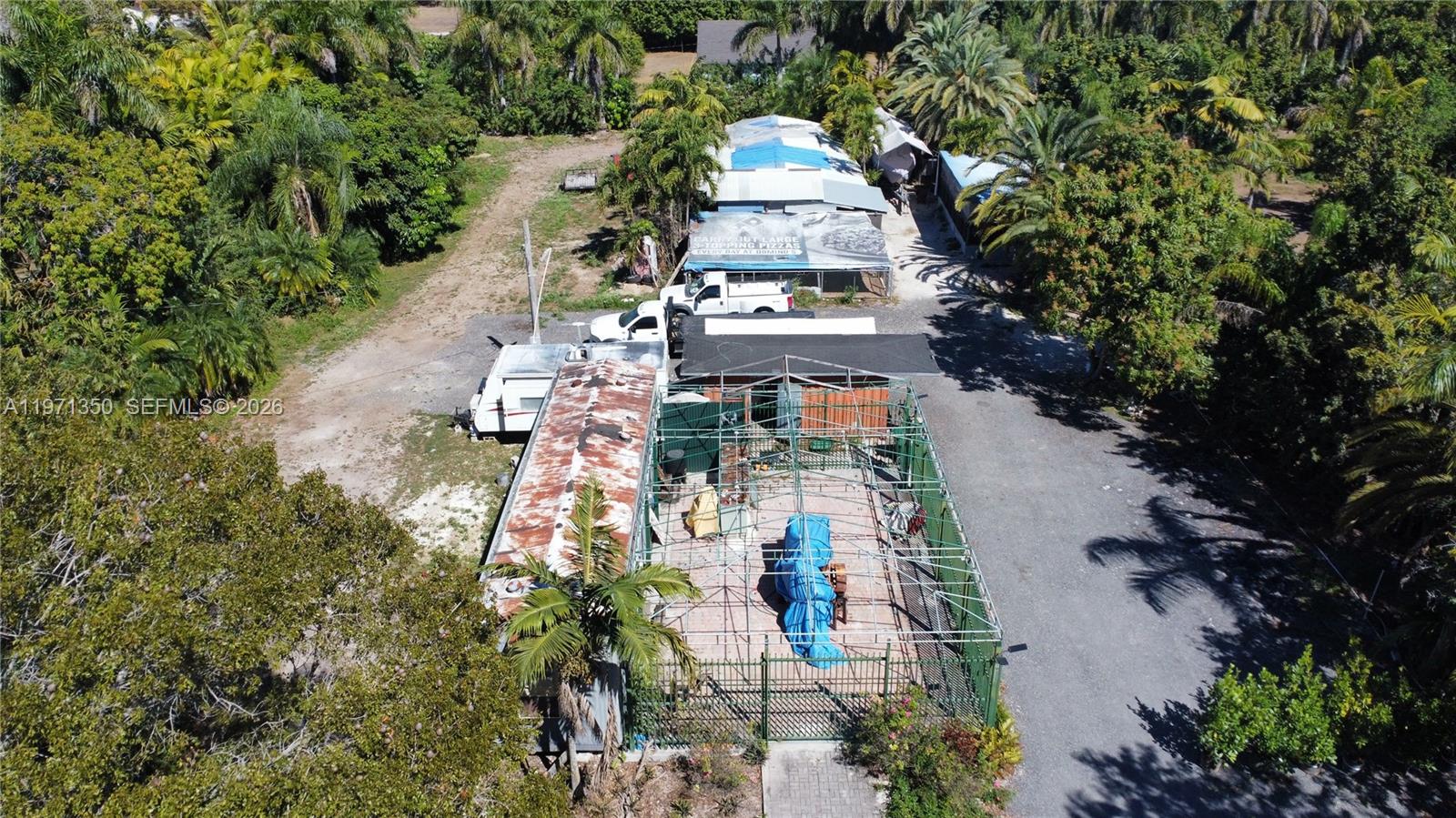 19355 Southwest 320th Street Homestead, FL 33030 - Photo 8 of 10 an aerial view of a house with outdoor space