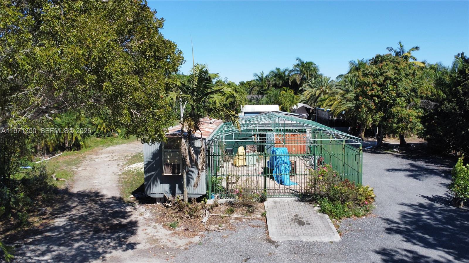19355 Southwest 320th Street Homestead, FL 33030 - Photo 9 of 10 a aerial view of a house with a yard
