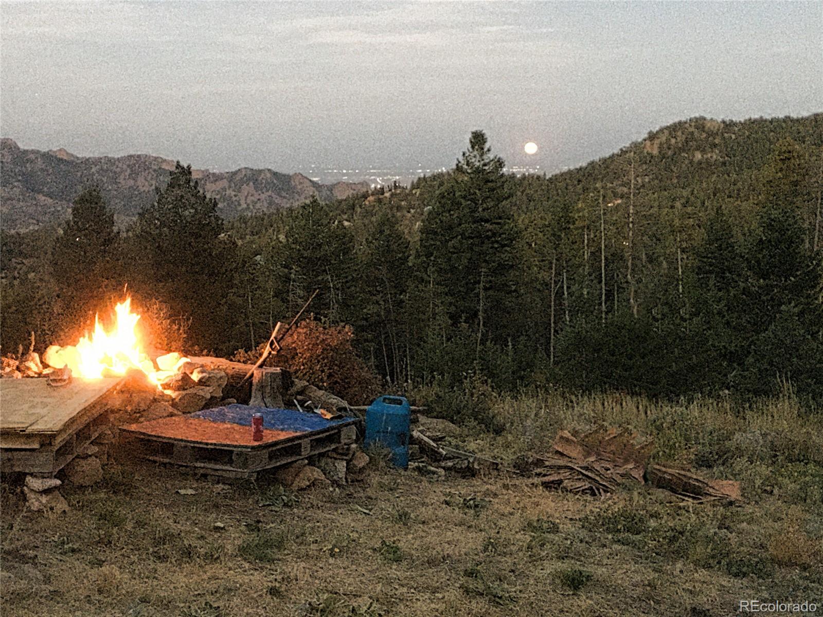 93 Gross Dam Road Golden, CO 80403 - Photo 14 of 35 a view of a fountain in a yard
