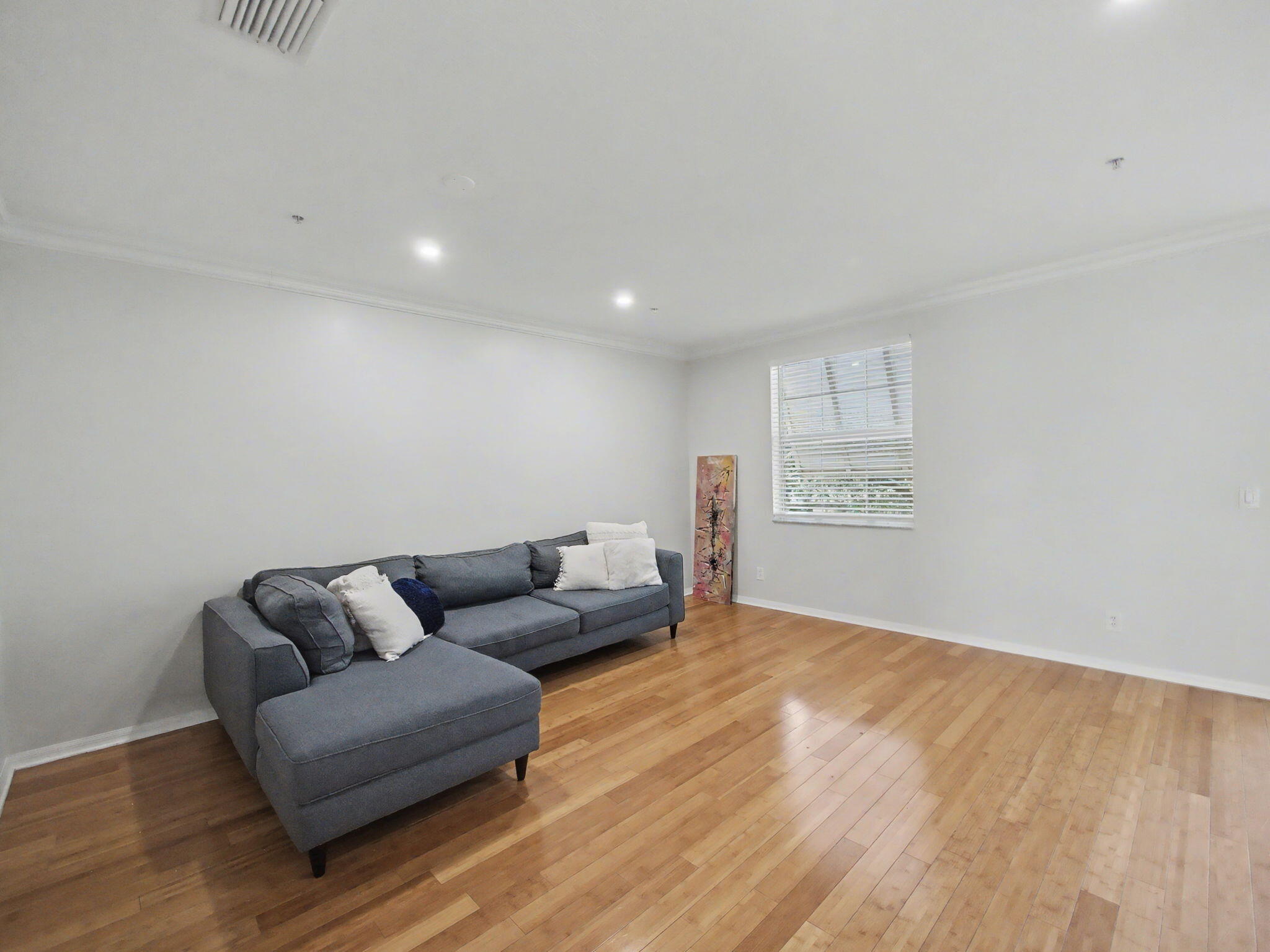 1460 Corbison Point Place Jupiter, FL 33458 - Photo 11 of 85 a living room with furniture and a wooden floor