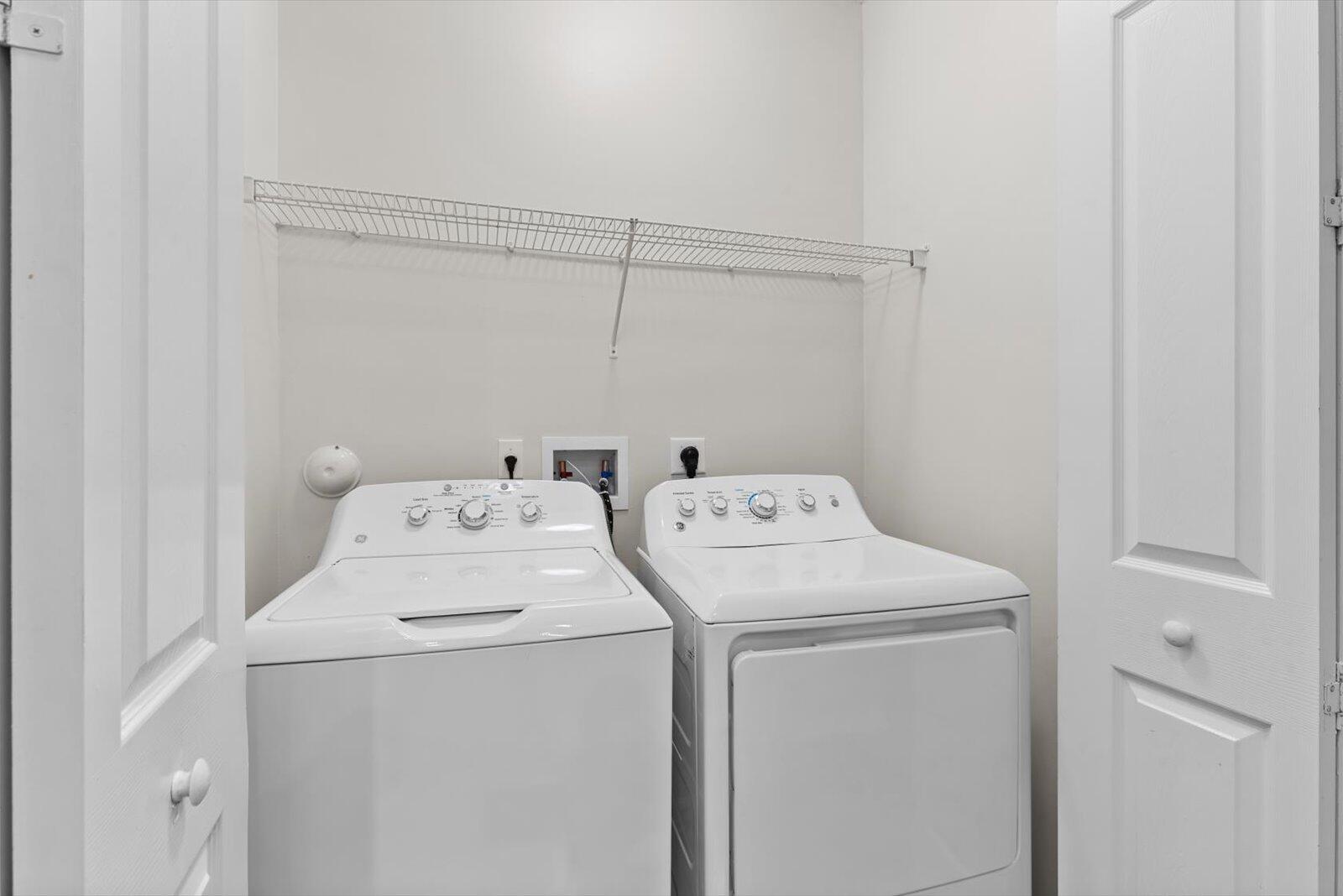 1460 Corbison Point Place Jupiter, FL 33458 - Photo 37 of 85 a utility room with dryer and washer