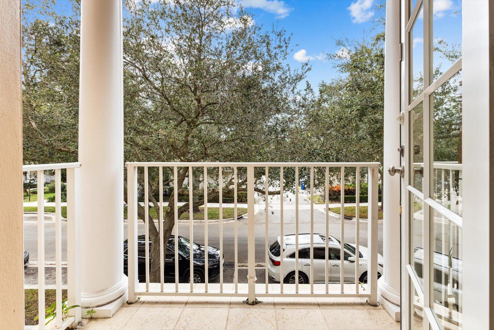 1460 Corbison Point Place Jupiter, FL 33458 - Photo 38 of 85 a view of a balcony with wooden floor