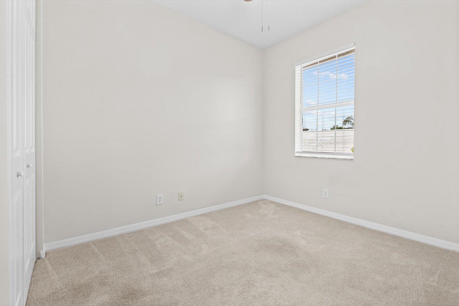 1460 Corbison Point Place Jupiter, FL 33458 - Photo 40 of 85 an empty room with a window