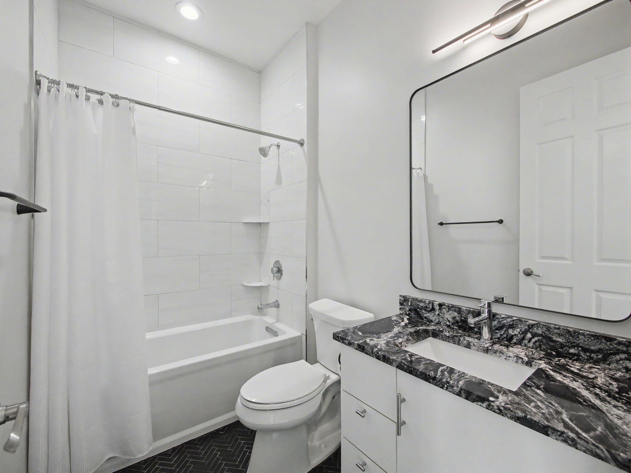 1460 Corbison Point Place Jupiter, FL 33458 - Photo 43 of 85 a bathroom with a sink toilet double vanity and shower