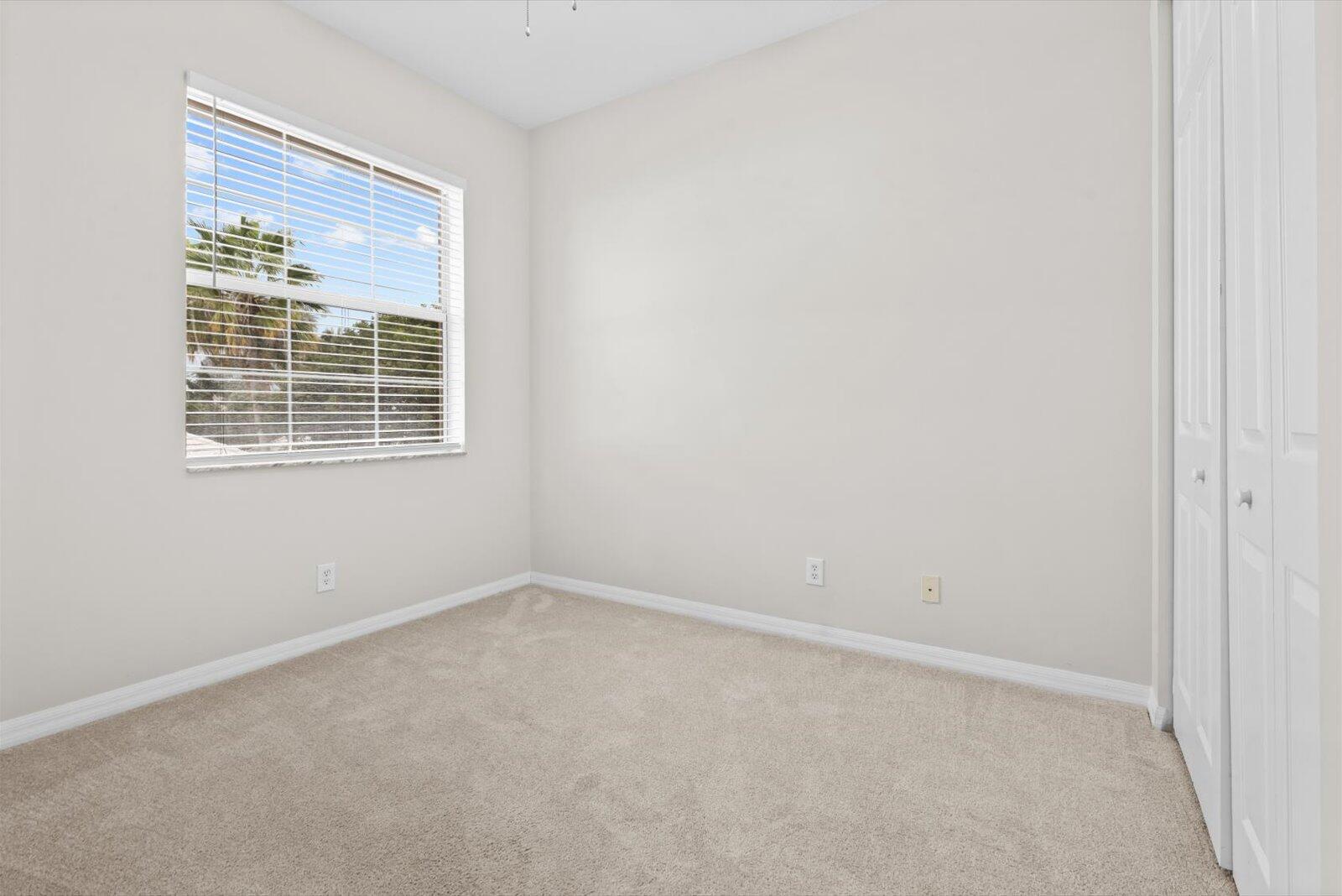1460 Corbison Point Place Jupiter, FL 33458 - Photo 44 of 85 an empty room with a window
