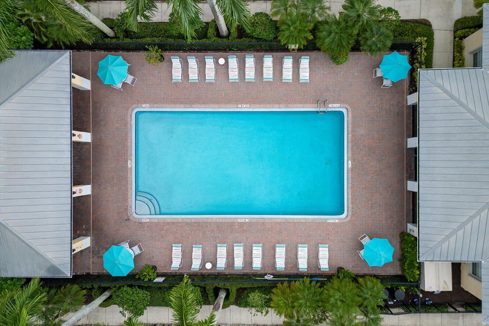 1460 Corbison Point Place Jupiter, FL 33458 - Photo 60 of 85 a front view of a house with a yard