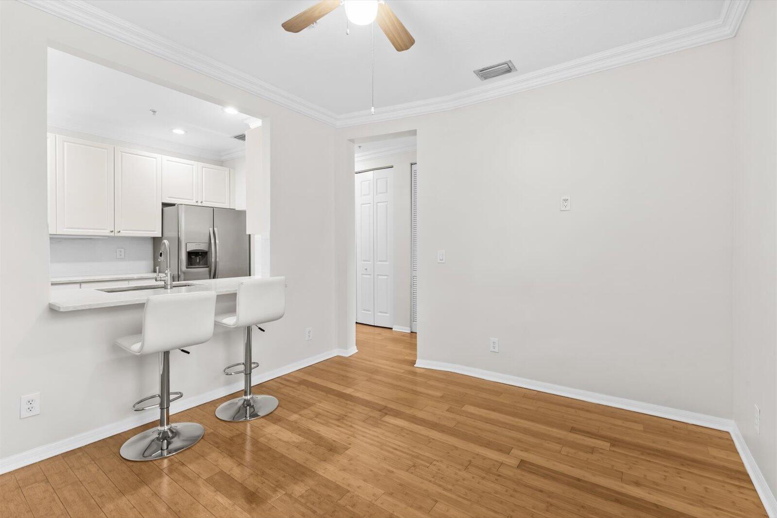 1460 Corbison Point Place Jupiter, FL 33458 - Photo 7 of 85 a room with a sink and cabinets