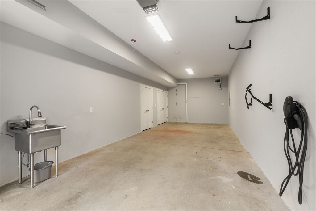 577 Baker Street, Unit 577 Boston, MA 02132 - Photo 19 of 22 a view of a livingroom with a sink