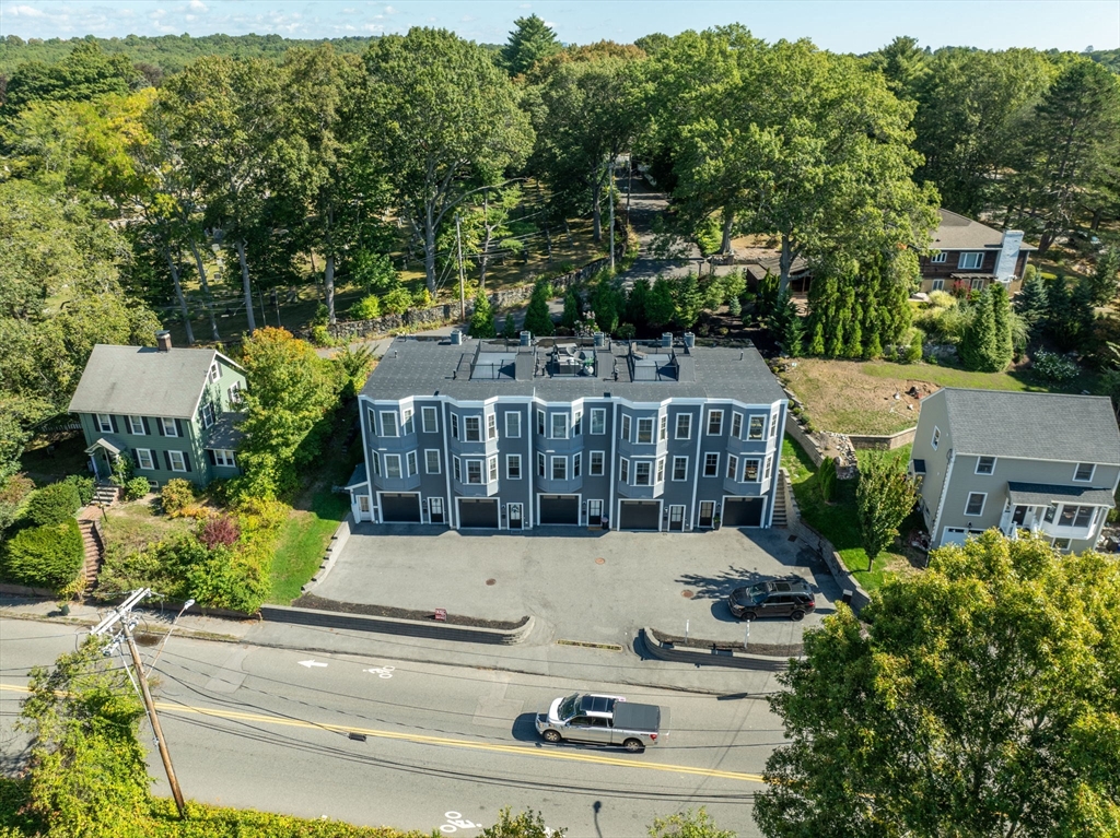 577 Baker Street, Unit 577 Boston, MA 02132 - Photo 21 of 22 an aerial view of a house with swimming pool garden and tree