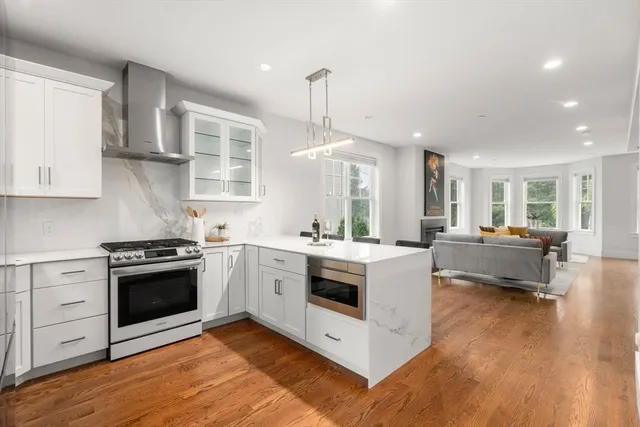 a kitchen with a stove and a sink