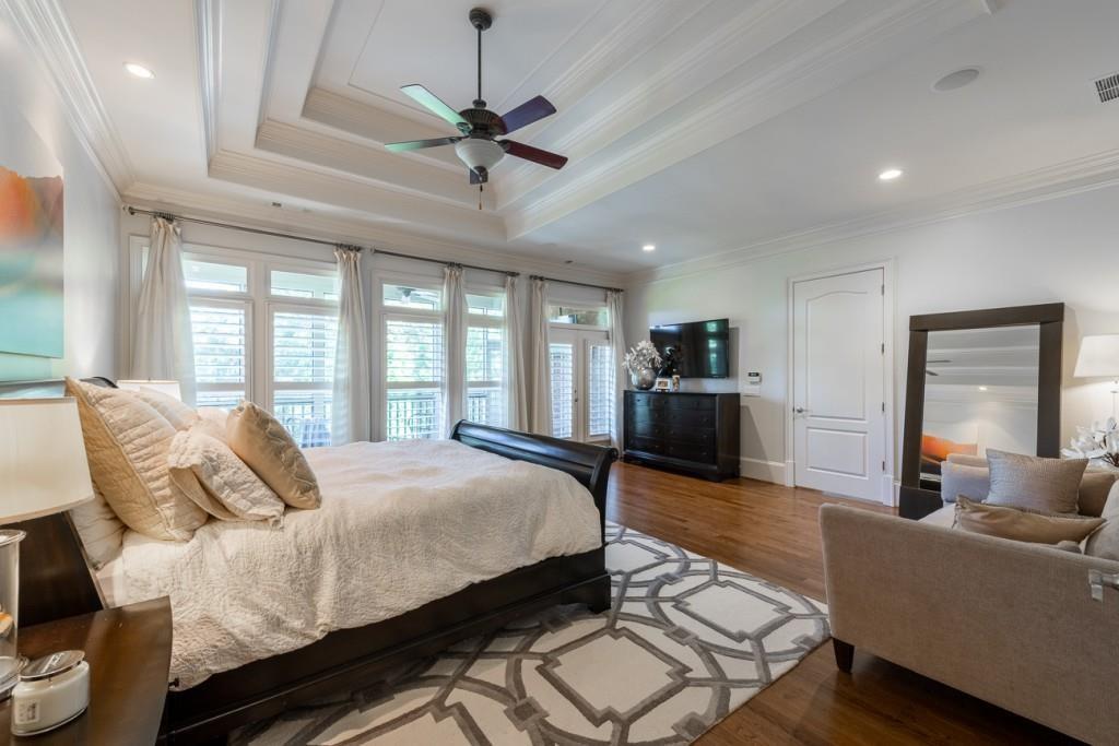 165 Autry Trail Alpharetta, GA 30022 - Photo 26 of 70 a bedroom with a bed and wooden floor