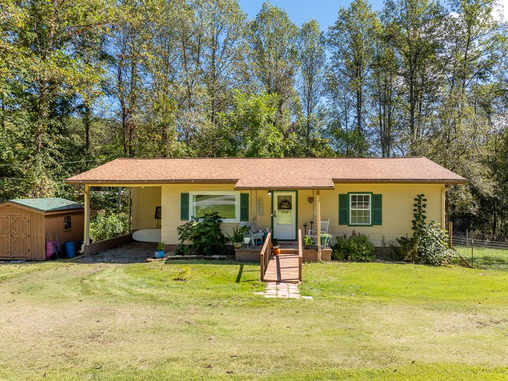 1813 John Smith Road East Blairsville, GA 30512 - Photo 41 of 41 a view of a house with pool and chairs