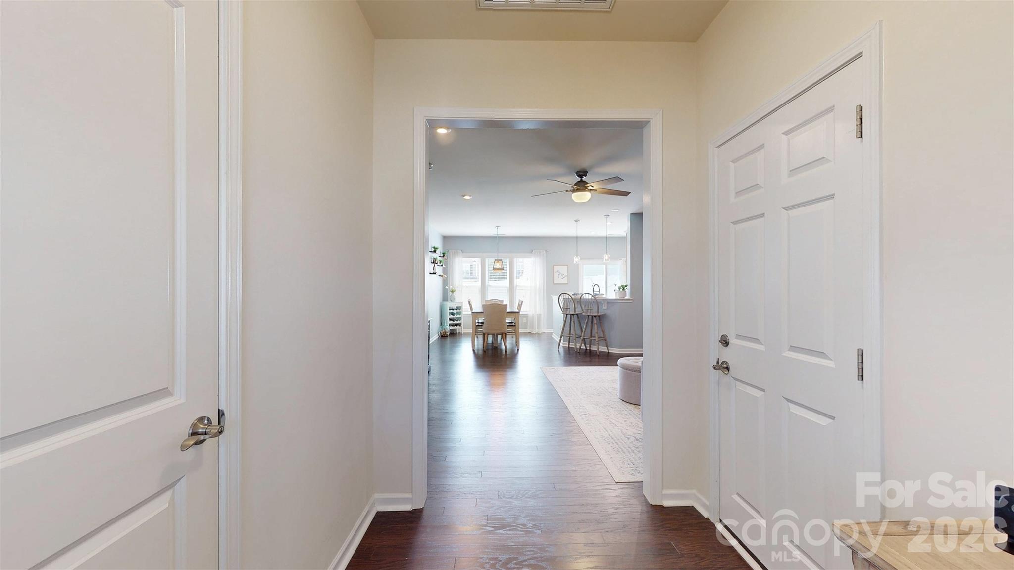 827 Canoe Song Road Fort Mill, SC 29708 - Photo 3 of 33 a view of a hallway with wooden floor and furniture