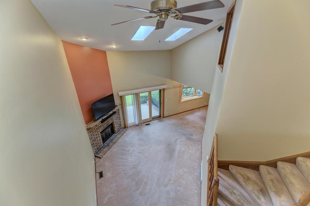 1753 Pebble Beach Drive Hoffman Estates, IL 60169 - Photo 8 of 35 a view of an entryway with a workspace