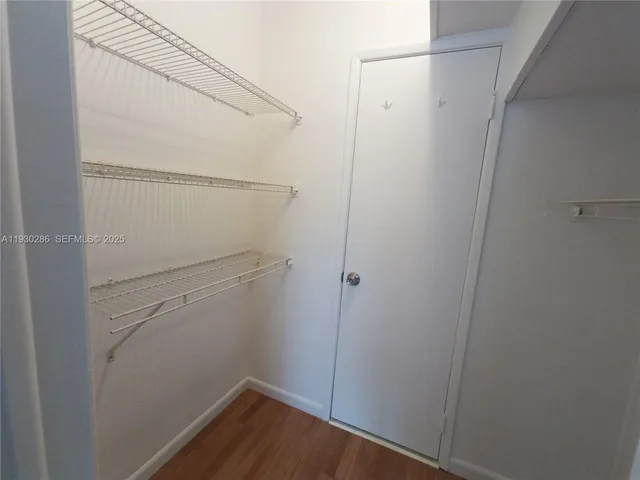 a view of small space with racks on the wall