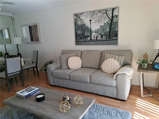 a living room with furniture and a couch