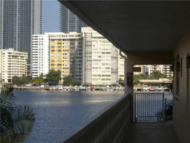 a view of a room with a large window