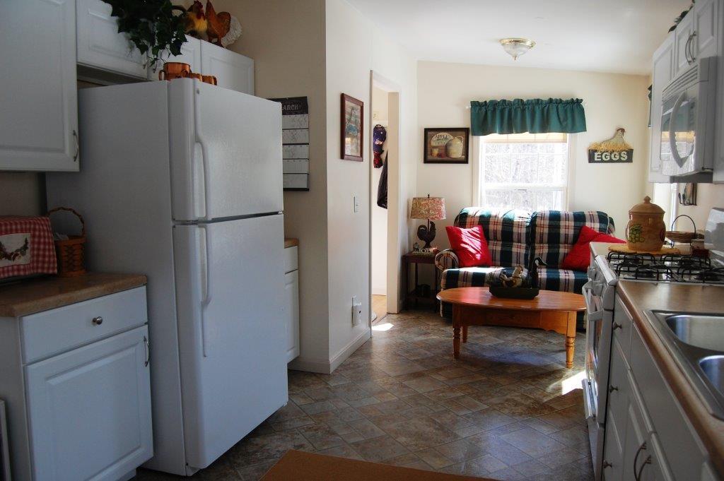 26 Tasker Road Augusta, ME 04330 - Photo 8 of 18 Kitchen viewing into Living Room