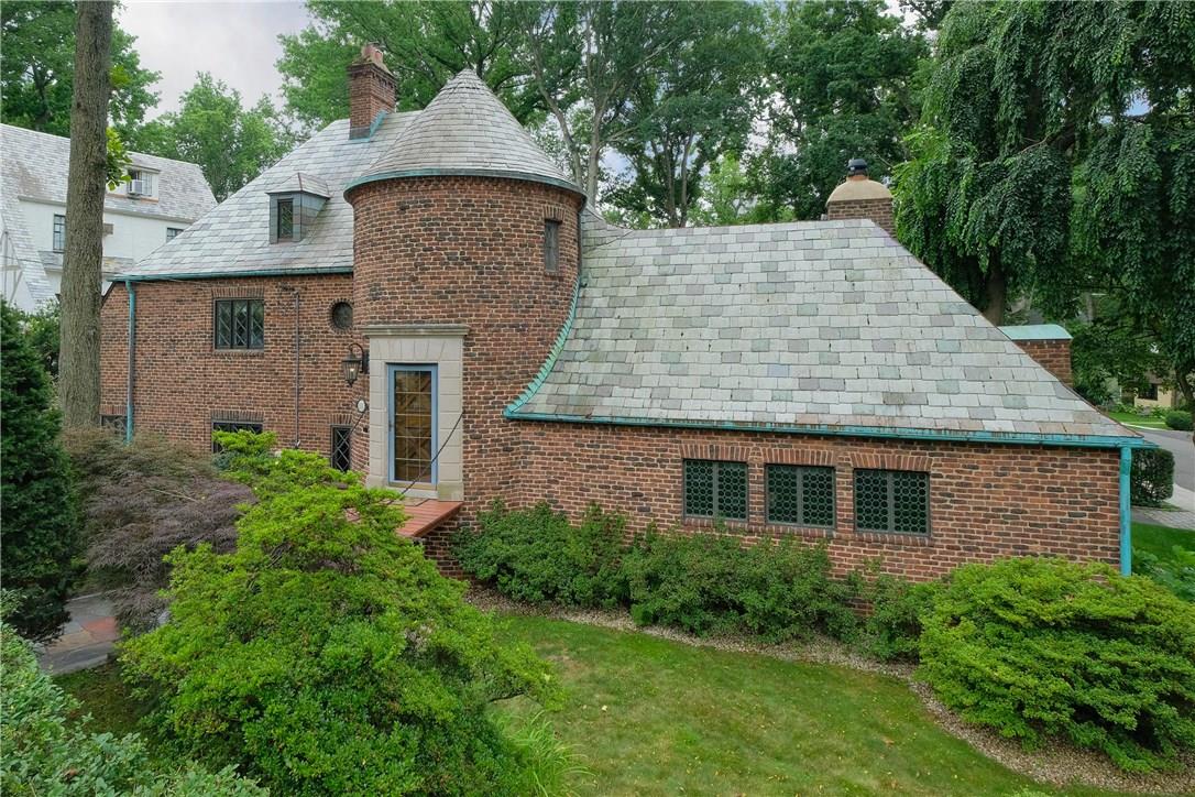 111 Wildwood Road New Rochelle, NY 10804 - Photo 1 of 1 a aerial view of a house with a yard and potted plants