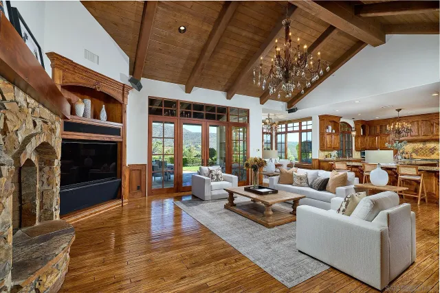 a kitchen with stainless steel appliances granite countertop a stove and a sink