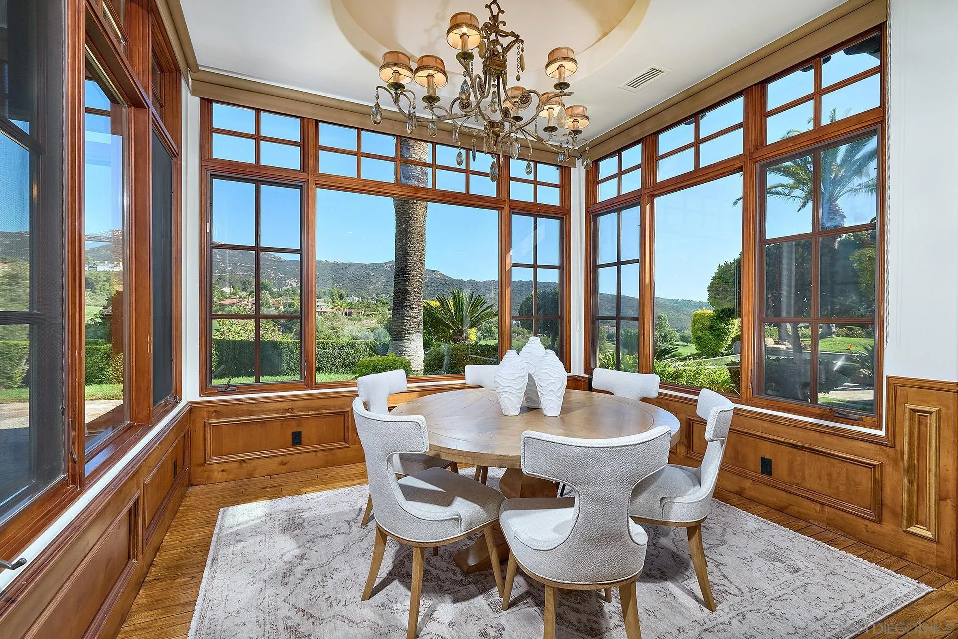 14155 Biscayne Place Poway, CA 92064 - Photo 21 of 54 a view of a dining room with furniture large windows and wooden floor