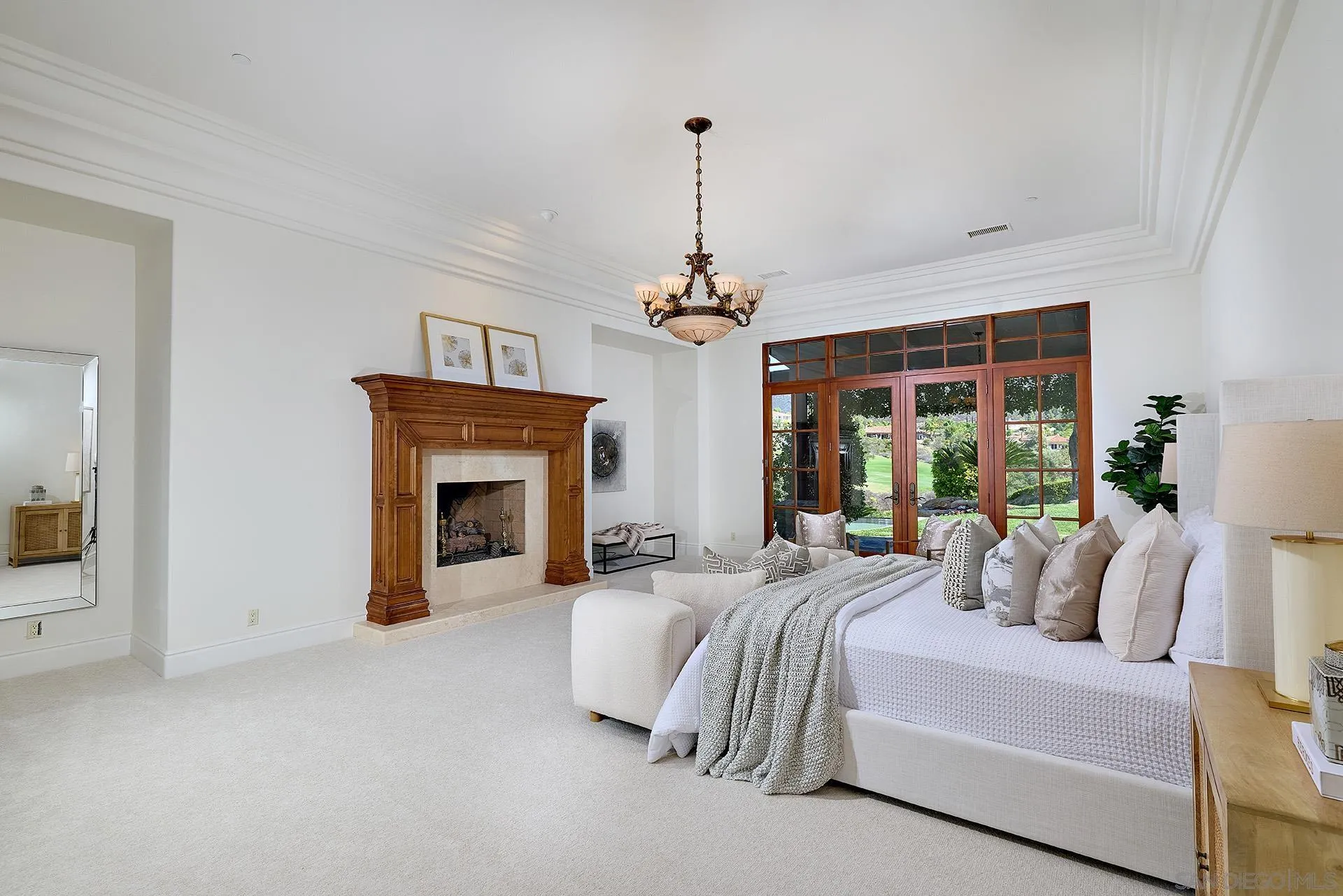 14155 Biscayne Place Poway, CA 92064 - Photo 25 of 54 a spacious bedroom with a bed and a fireplace