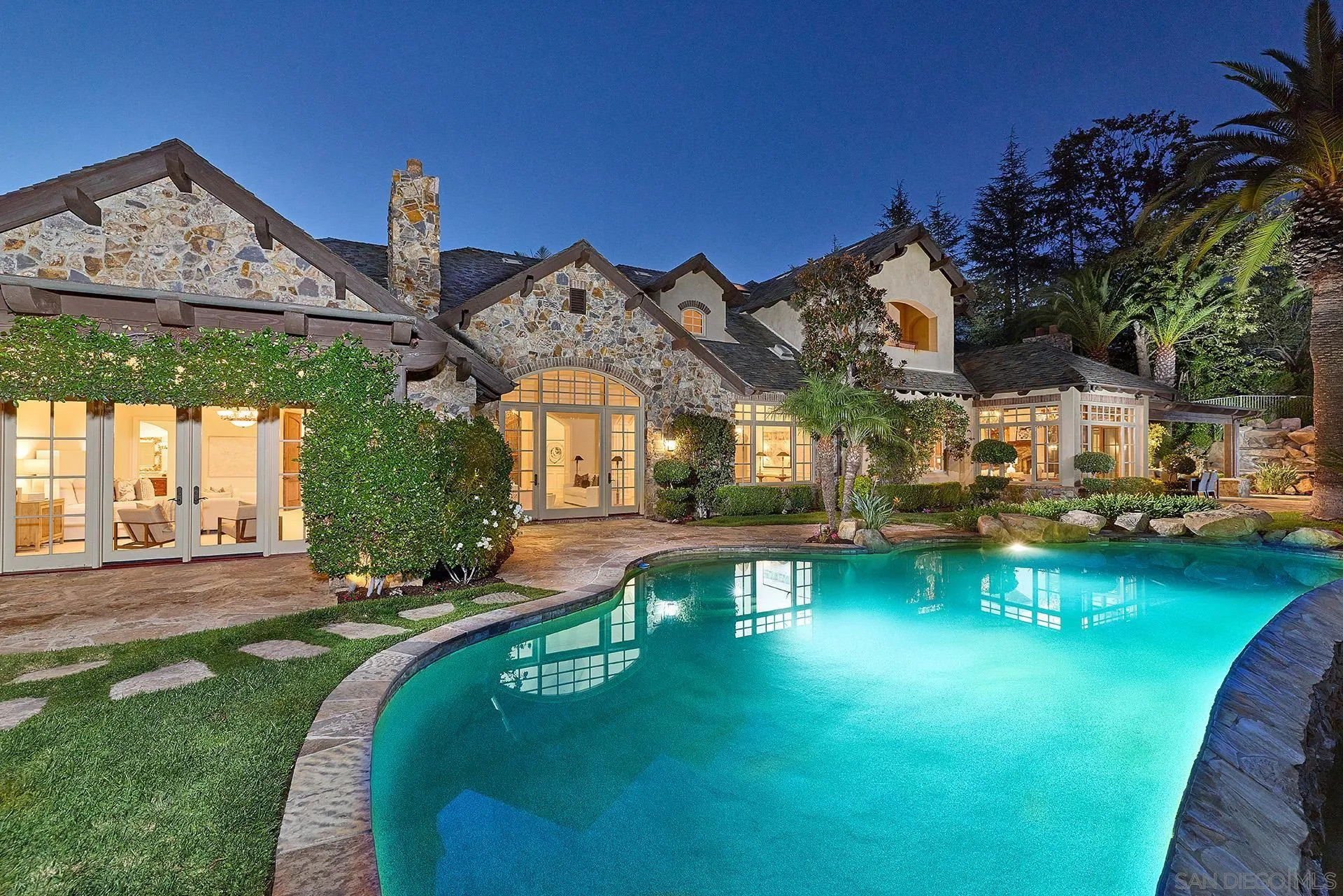 14155 Biscayne Place Poway, CA 92064 - Photo 3 of 56 a view of a house with a swimming pool and a yard