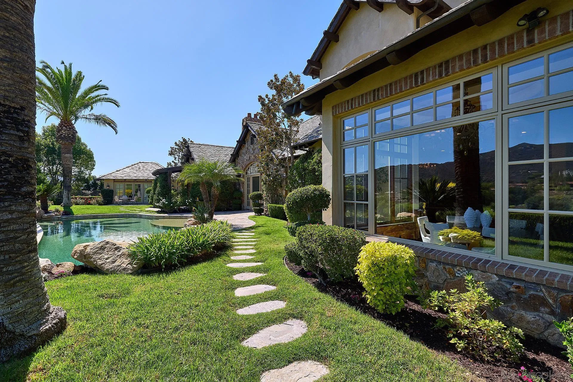 14155 Biscayne Place Poway, CA 92064 - Photo 38 of 56 a view of a house with a garden