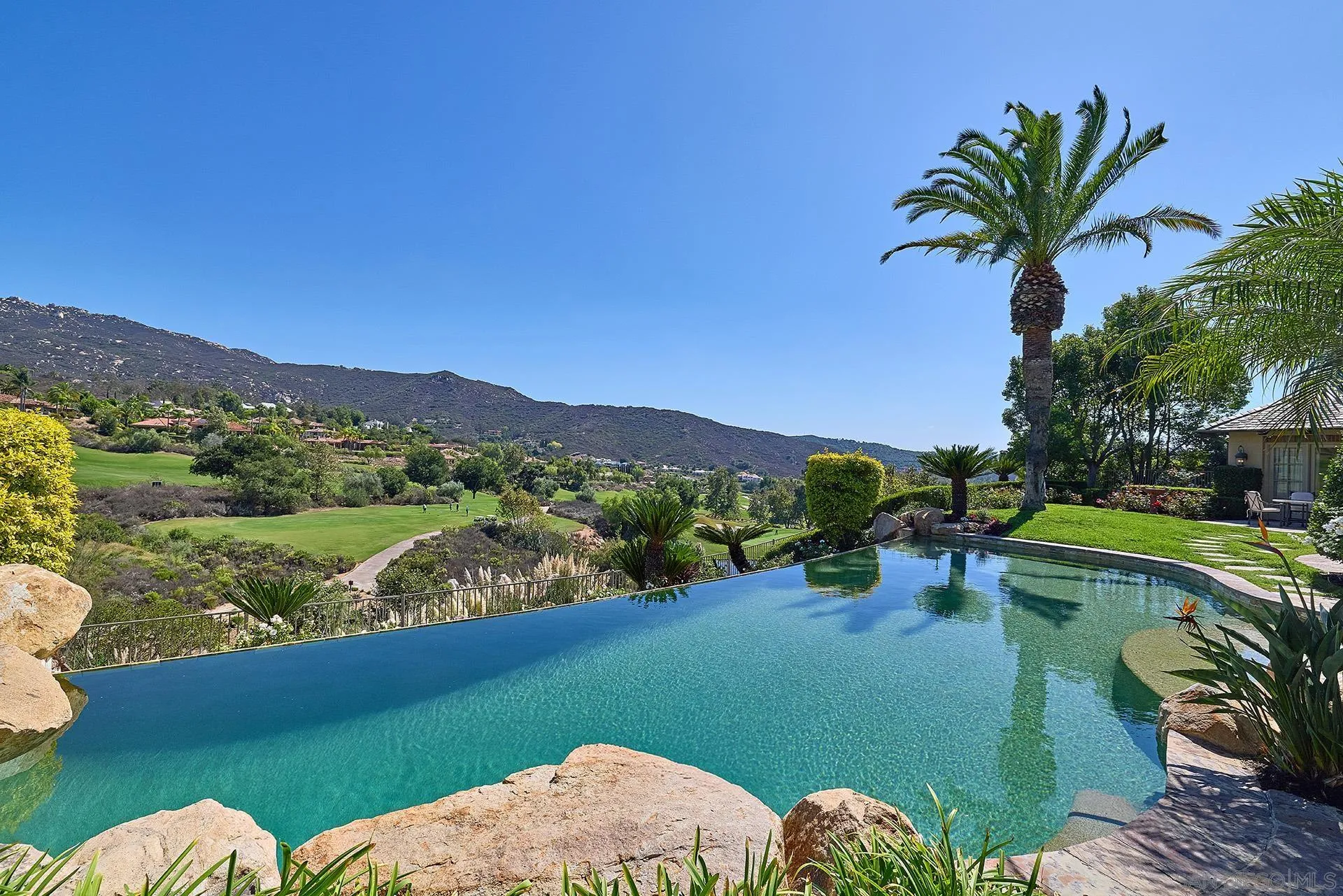 14155 Biscayne Place Poway, CA 92064 - Photo 47 of 54 a view of a lake with a mountain in the background