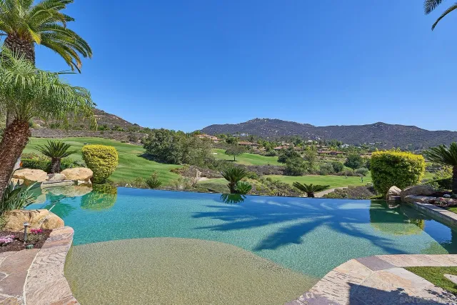 an aerial view of residential house and outdoor space