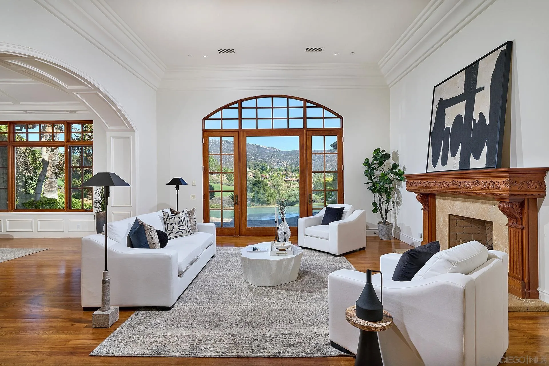 14155 Biscayne Place Poway, CA 92064 - Photo 9 of 54 a living room with furniture a fireplace and a large window