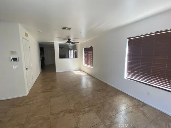 a view of a livingroom with a kitchen