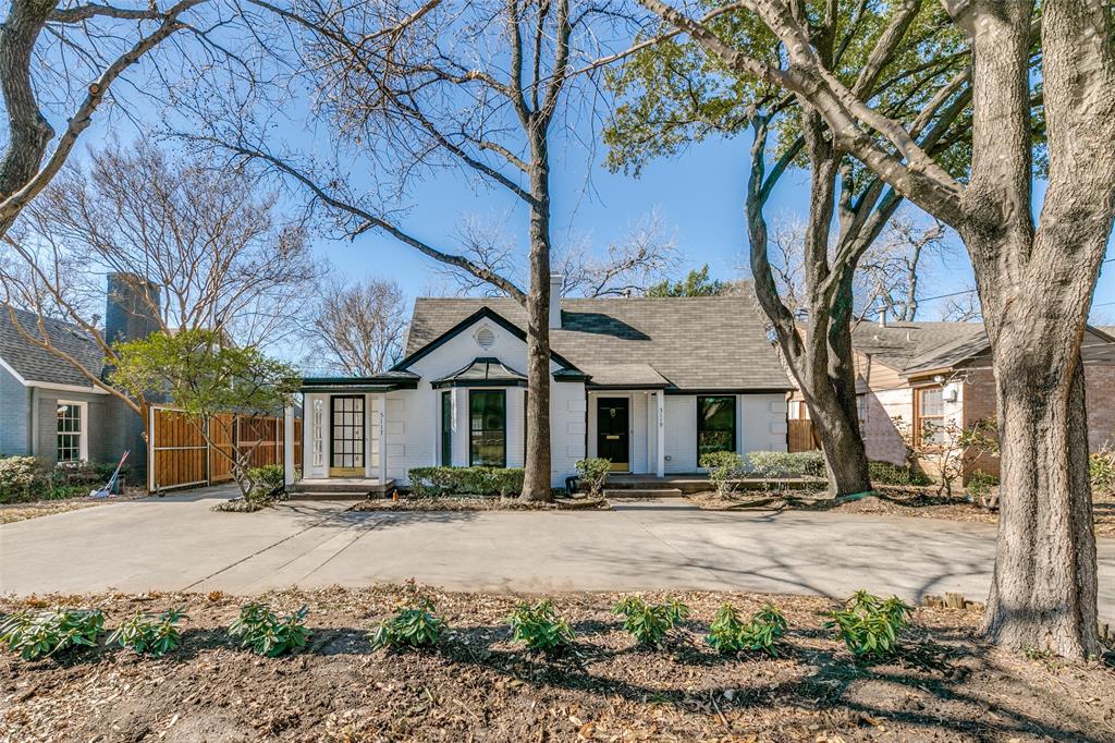 5117 Maple Springs Boulevard Dallas, TX 75235 - Photo 1 of 15 a front view of a building with street view