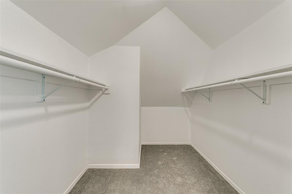 5117 Maple Springs Boulevard Dallas, TX 75235 - Photo 13 of 15 a view of an empty walk in closet