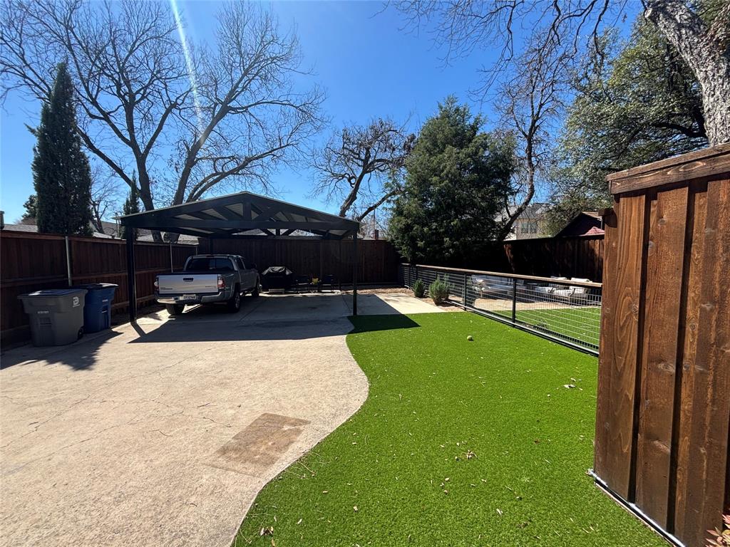 5117 Maple Springs Boulevard Dallas, TX 75235 - Photo 14 of 15 a view of a park with large trees