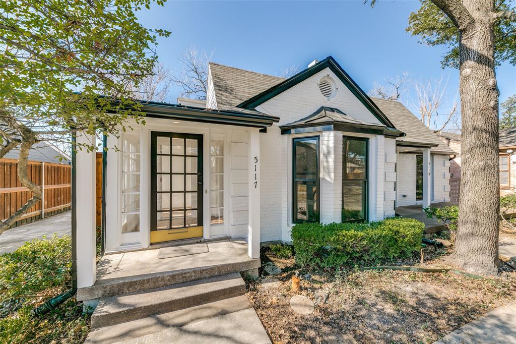5117 Maple Springs Boulevard Dallas, TX 75235 - Photo 2 of 15 a front view of a house with a yard