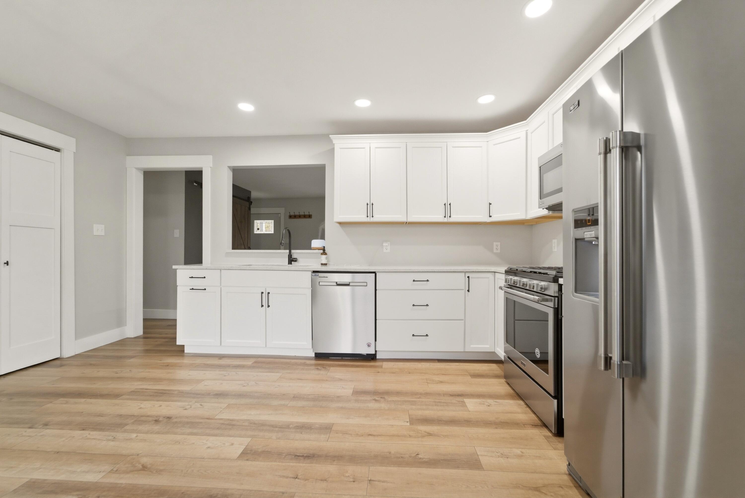 579 Fargo Road Westville, IN 46391 - Photo 4 of 35 a kitchen with stainless steel appliances kitchen island granite countertop a refrigerator and a sink