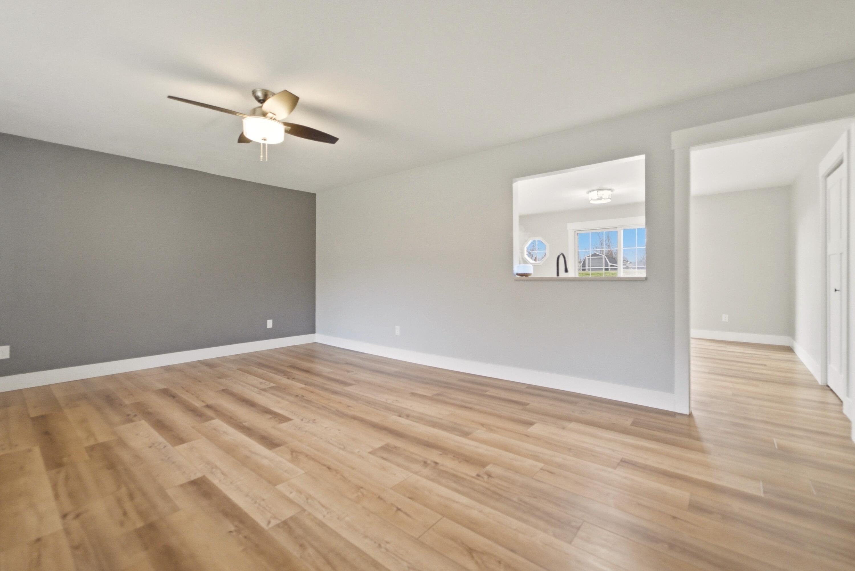 579 Fargo Road Westville, IN 46391 - Photo 7 of 35 a view of an empty room with wooden floor