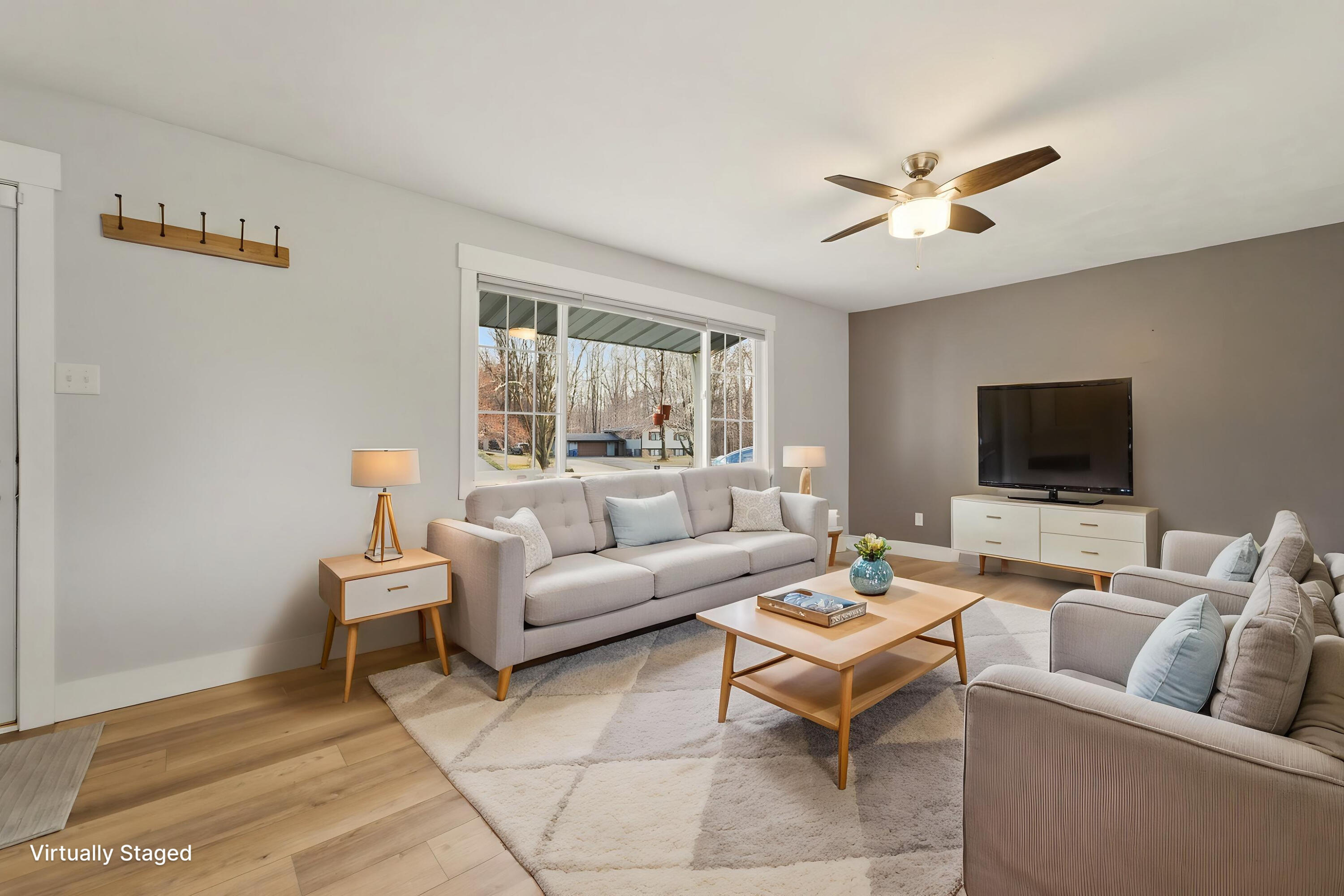 579 Fargo Road Westville, IN 46391 - Photo 10 of 35 a living room with furniture and a flat screen tv