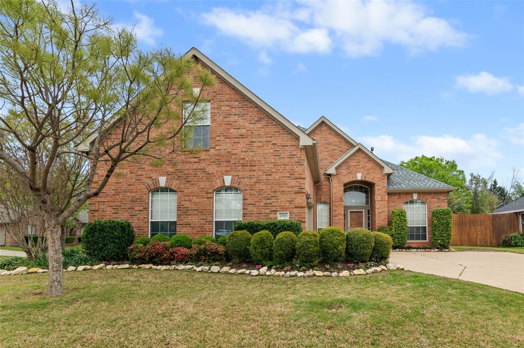 2501 Shiloh Road Denton, TX 76210 - Photo 1 of 1 a front view of a house with a yard