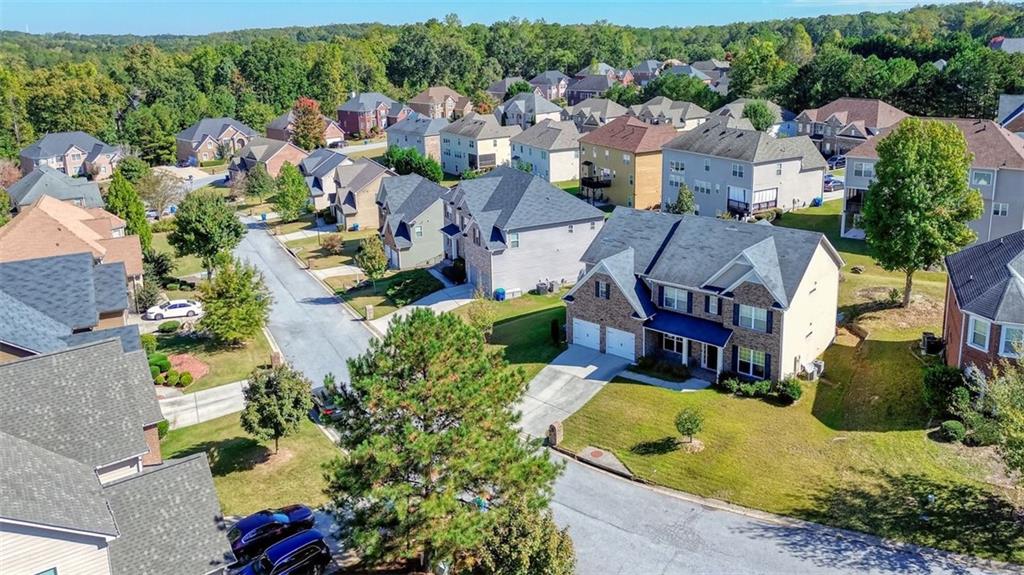 5646 Boreal Way Southwest Atlanta, GA 30331 - Photo 11 of 17 an aerial view of a house with a garden and lake view