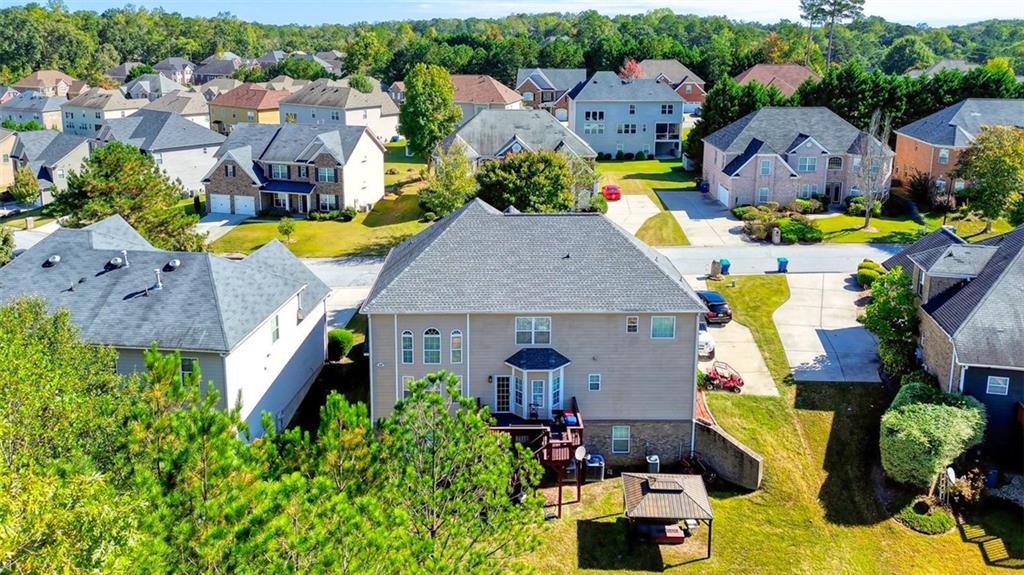 5646 Boreal Way Southwest Atlanta, GA 30331 - Photo 12 of 17 an aerial view of a house with a swimming pool outdoor seating and yard