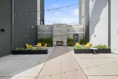 a view of a swimming pool with a patio