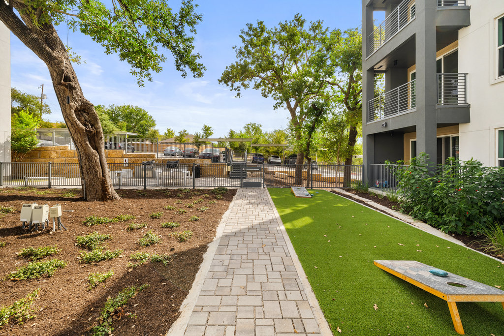 4801 Springdale Road, Unit 1106 Austin, TX 78723 - Photo 18 of 40 a view of a swimming pool with a patio