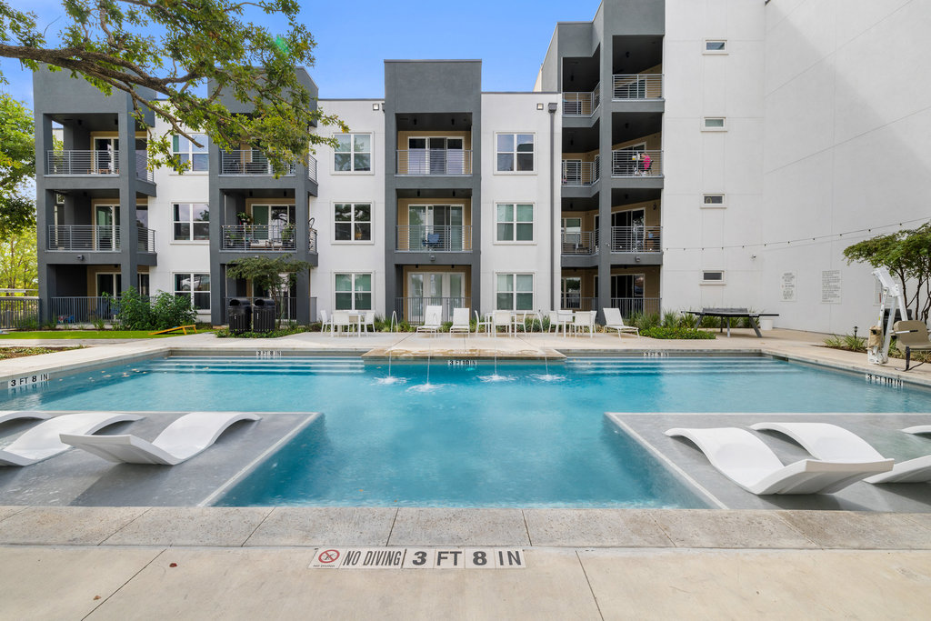 4801 Springdale Road, Unit 1106 Austin, TX 78723 - Photo 20 of 40 a view of pool with building exterior
