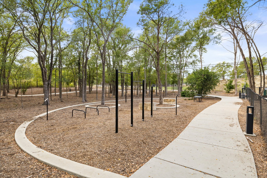 4801 Springdale Road, Unit 1106 Austin, TX 78723 - Photo 27 of 40 a view of a park with swings