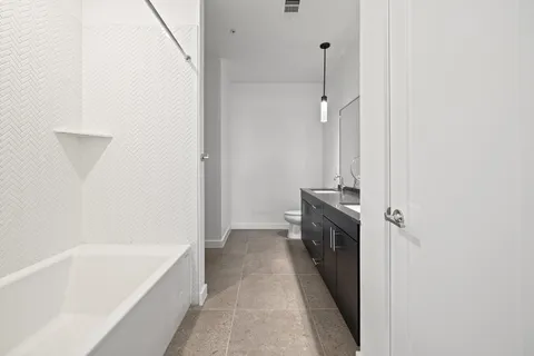 a view of entryway with washer and dryer