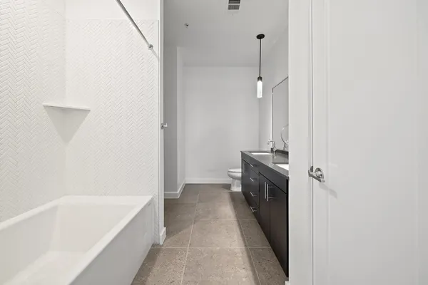 a view of entryway with washer and dryer